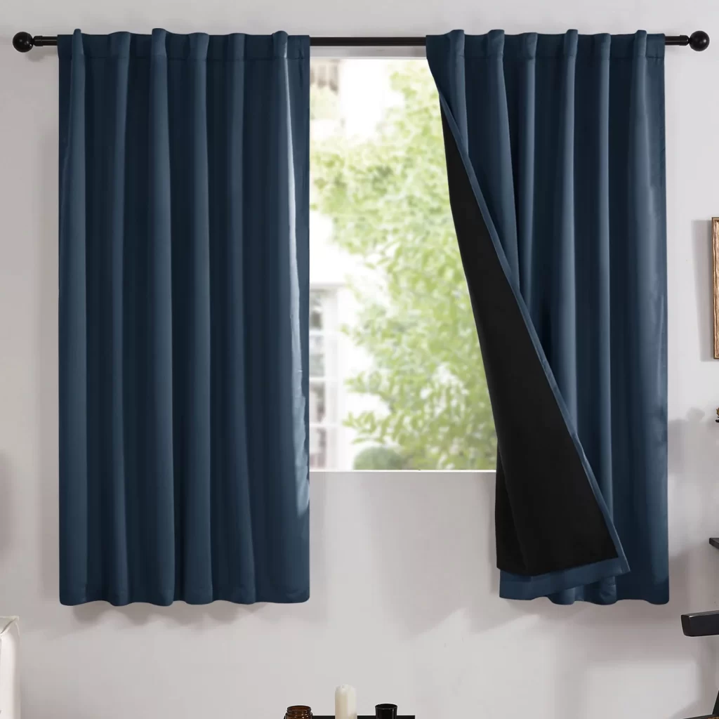 Bedroom with navy blue blackout curtains