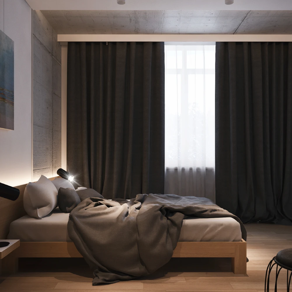 Full-length blackout curtains in a spacious master bedroom.