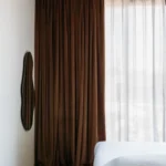 Velour blackout hanging on window