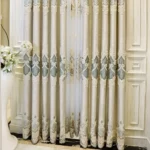 Luxurious embroidered living room blackout curtains with intricate floral patterns