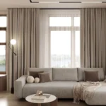 interior design showcasing extra-wide living room blackout curtains in taupe