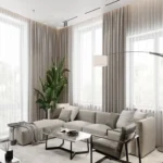 minimalist lounge featuring extra-wide living room blackout curtains in a soft beige velvet fabric.